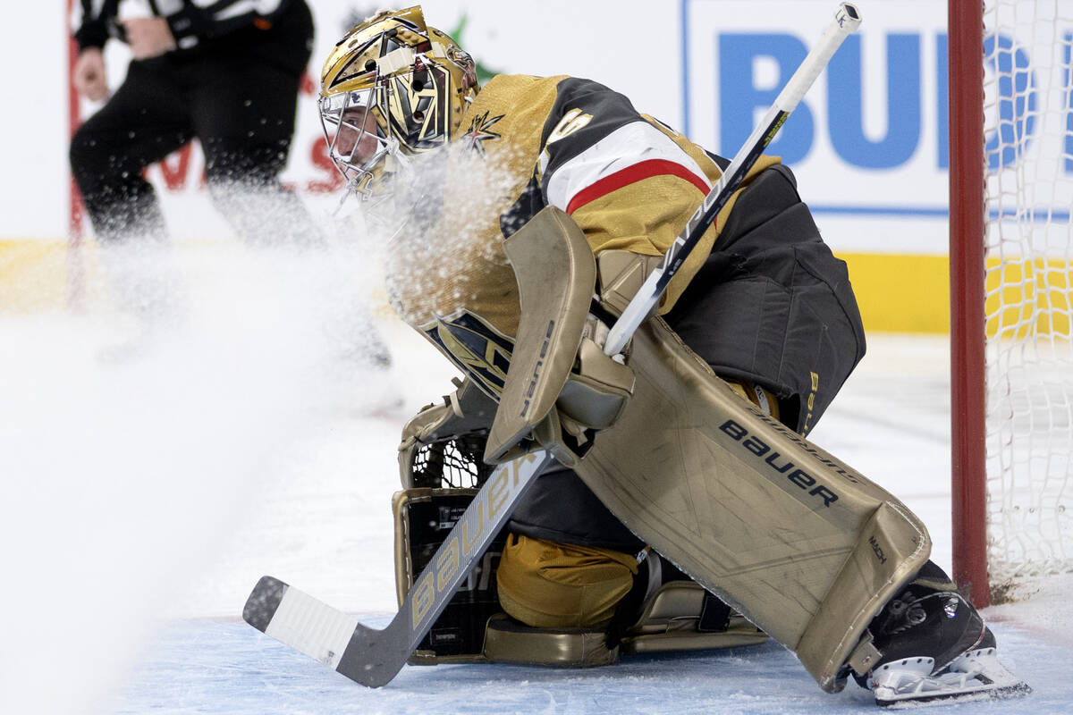 Golden Knights goaltender Logan Thompson (36) anticipates the puck during the second period of ...