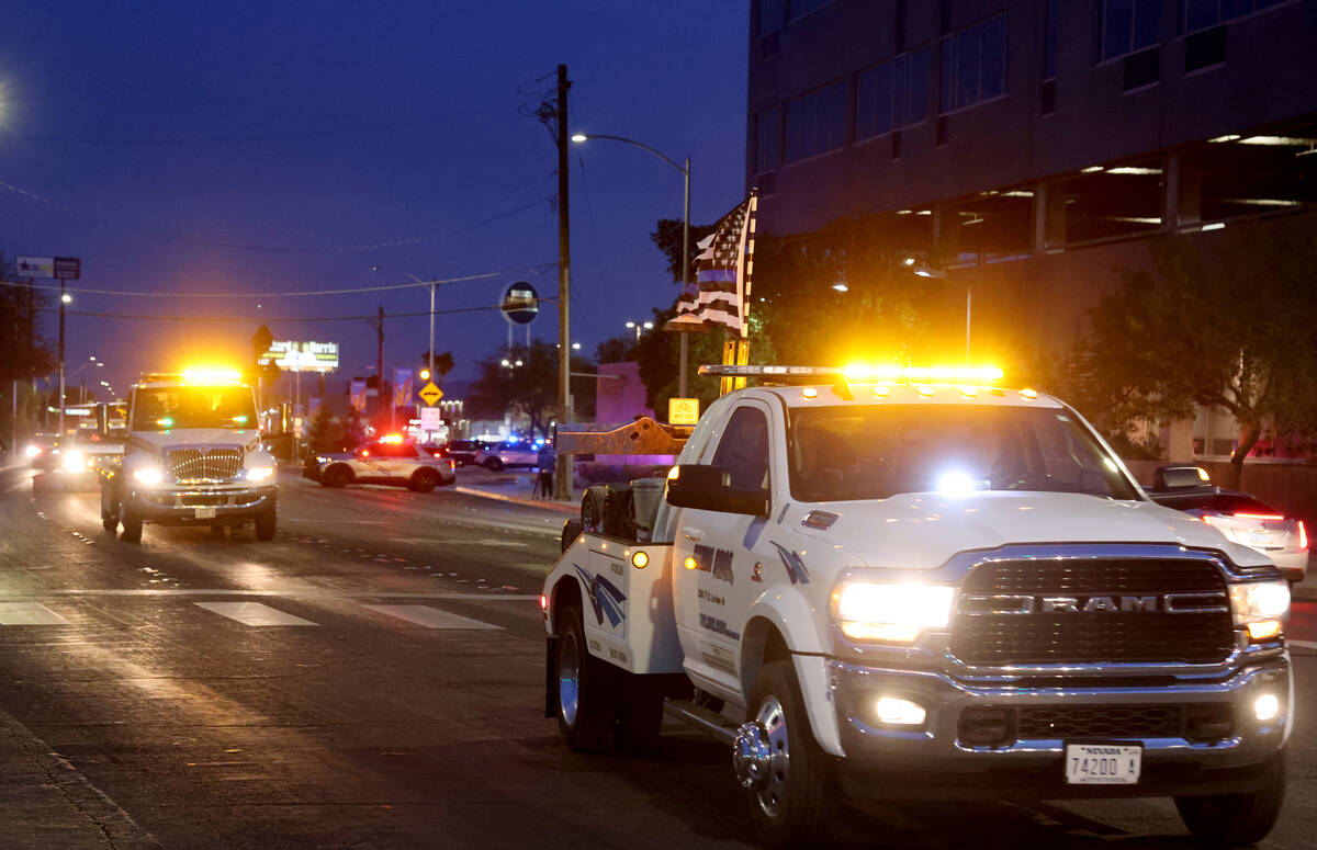 Tow truck operators, Nevada Highway Patrol and Capitol Police drive in a memorial procession fr ...