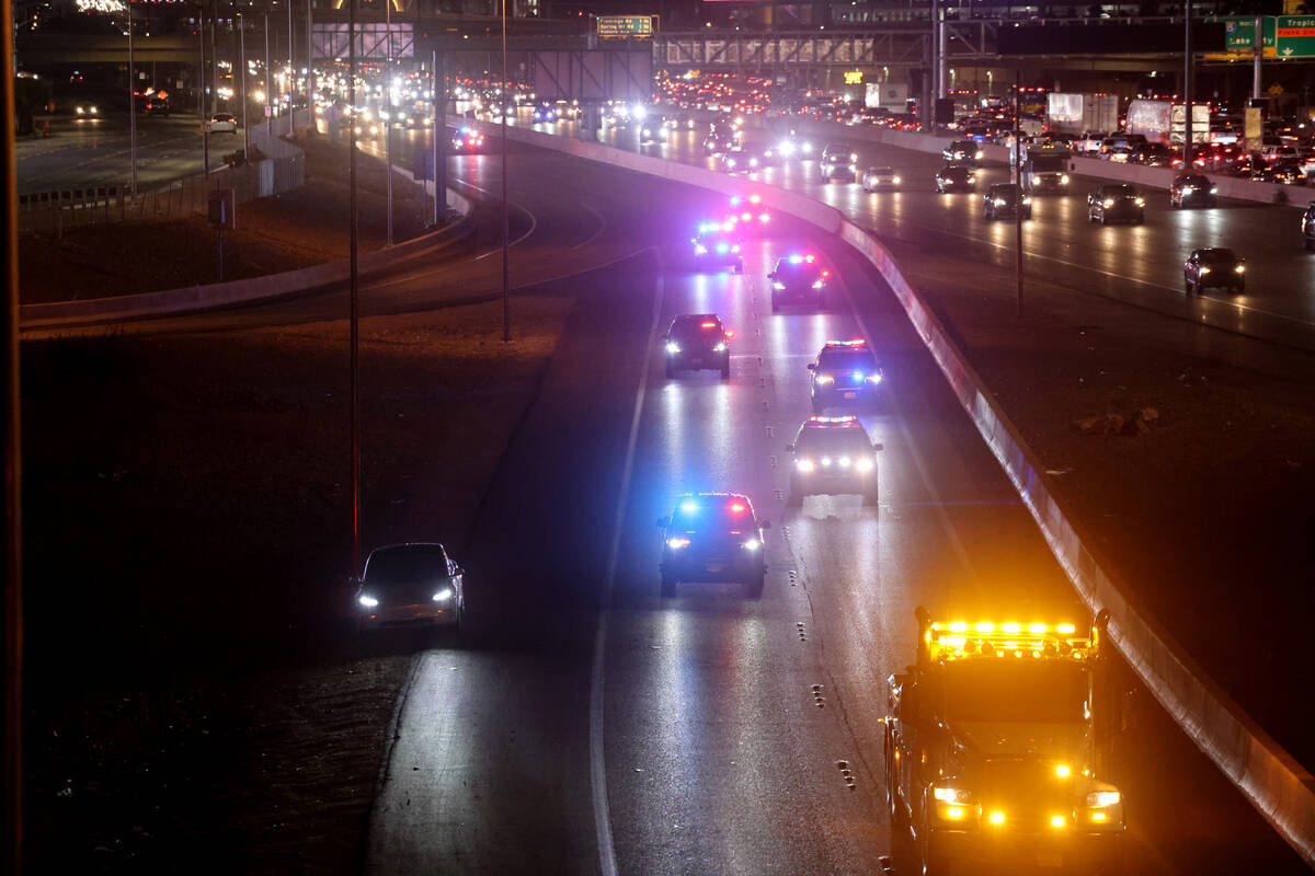 Tow truck operators, Nevada Highway Patrol and Capitol Police drive in a memorial procession on ...