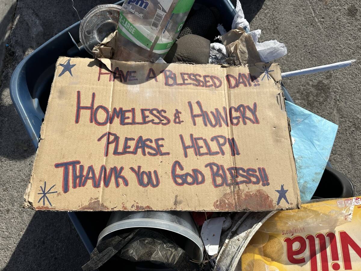 A cardboard sign at Charleston Boulevard and Honolulu Street in Las Vegas, where five homeless ...