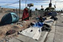 review journal com Tents and other items line the sidewalk at Charleston Boulevard and Honolulu Street in Las Vega ...