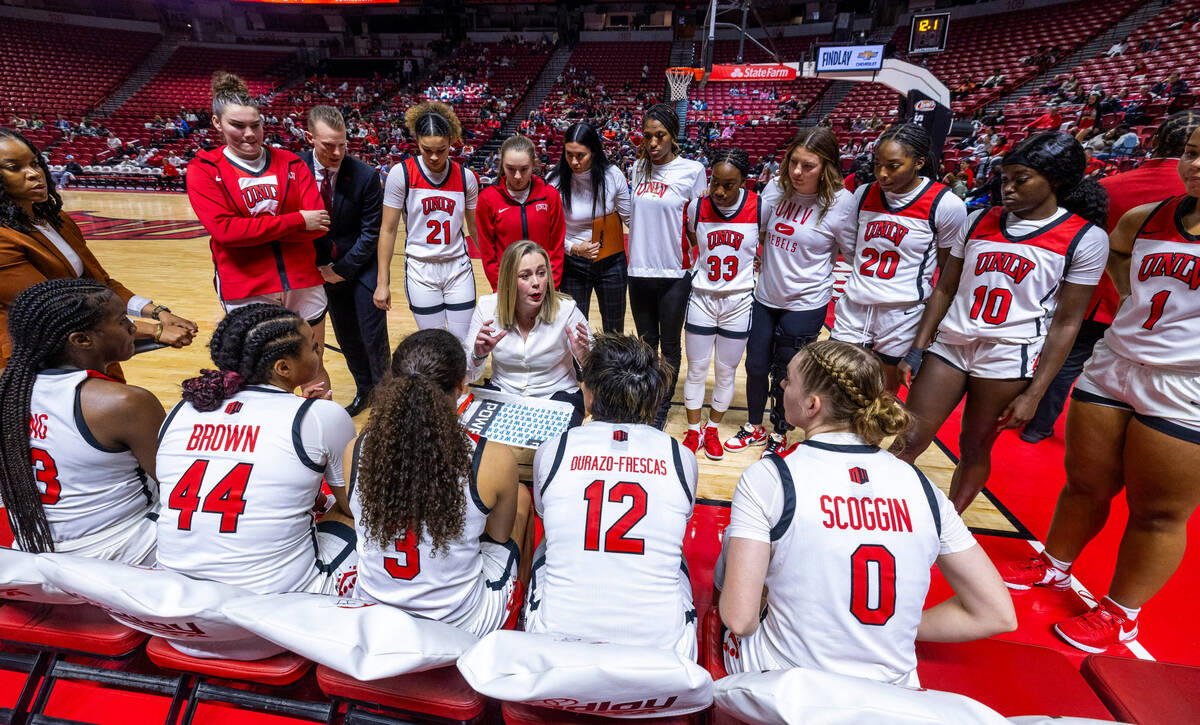 during the second half of their NCAA women's basketball game at the Thomas & Mack Center on ...