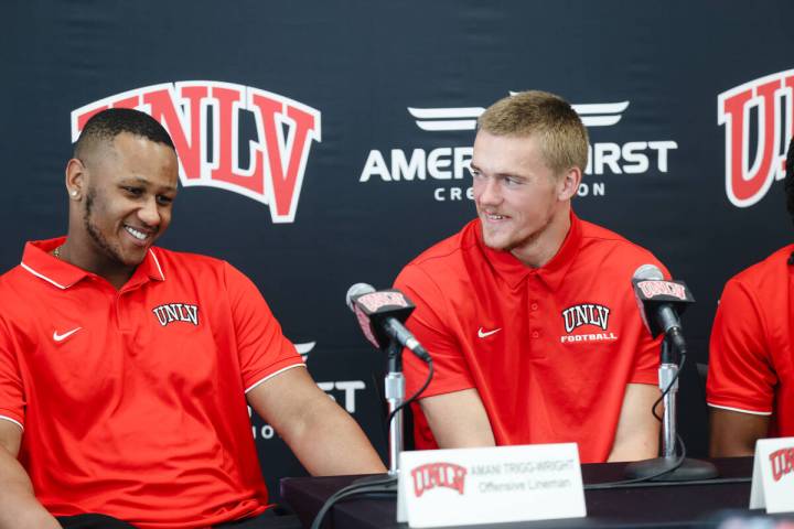 UNLV offensive lineman Amani Trigg-Wright, next to linebacker Jackson Woodward, addresses media ...