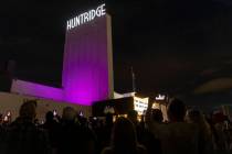 A crowd photographs as the Huntridge Theater marquee is lit on Friday, April 7, 2023, in Las Ve ...