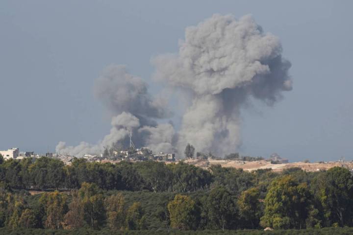 Smoke rises following an Israeli bombardment in the Gaza Strip, as seen from southern Israel on ...