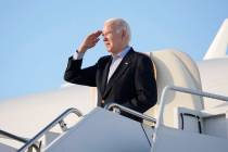 President Joe Biden boards Air Force One at Pueblo memorial Airport in Pueblo, Colo., Wednesday ...