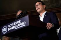 Pennsylvania Gov. Josh Shapiro speaks with members of the media during a news conference in Yar ...