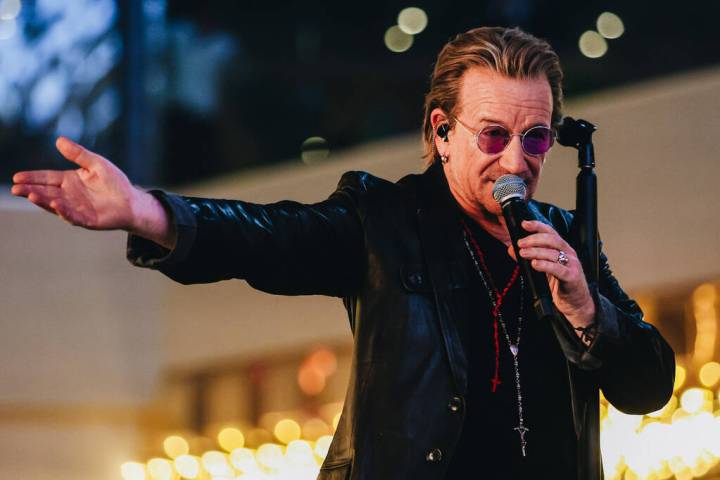 Bono of U2 performs while filming a music video in front of the Plaza hotel and casino on Sunda ...