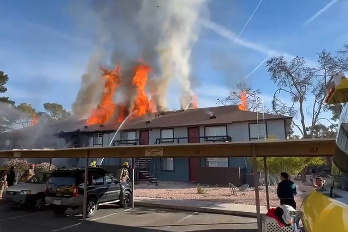Clark County Fire Department responds to a fire at an apartment building at 4255 W. Viking Road ...