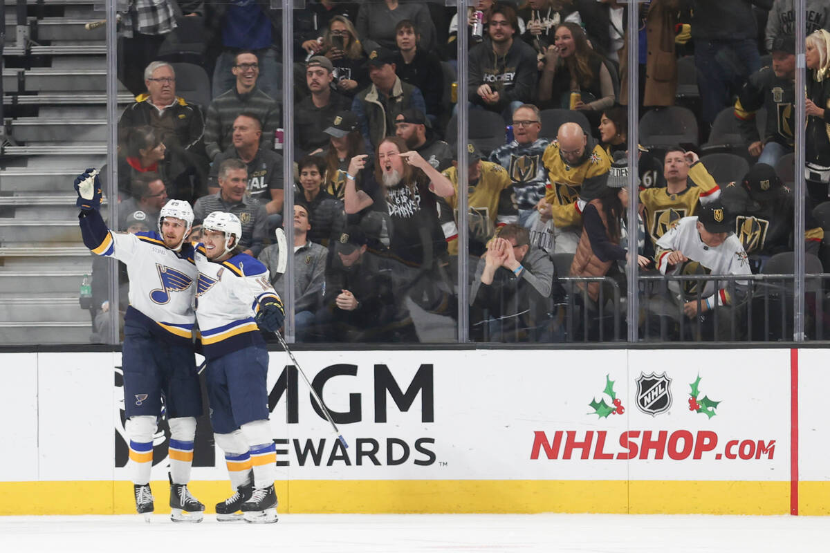 St. Louis Blues left wing Pavel Buchnevich (89) and center Robert Thomas (18) celebrate after B ...