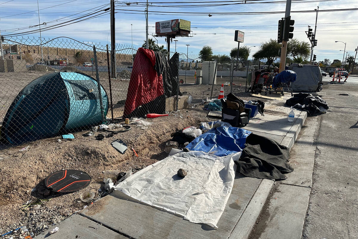 Tents and other items line the sidewalk at Charleston Boulevard and Honolulu Street in Las Vega ...
