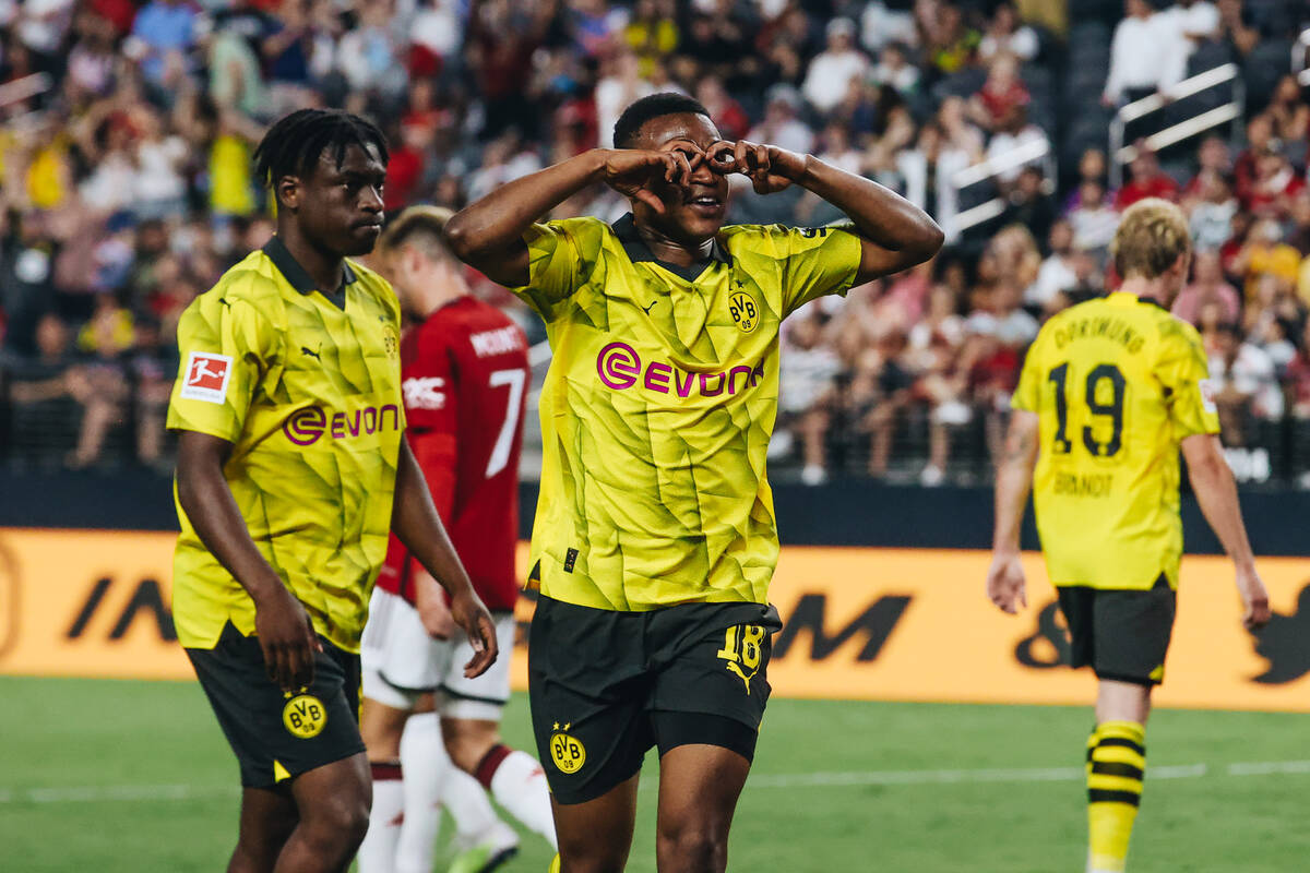 Borussia Dortmund forward Youssoufa Moukoko (18) celebrates after scoring a goal in a match aga ...