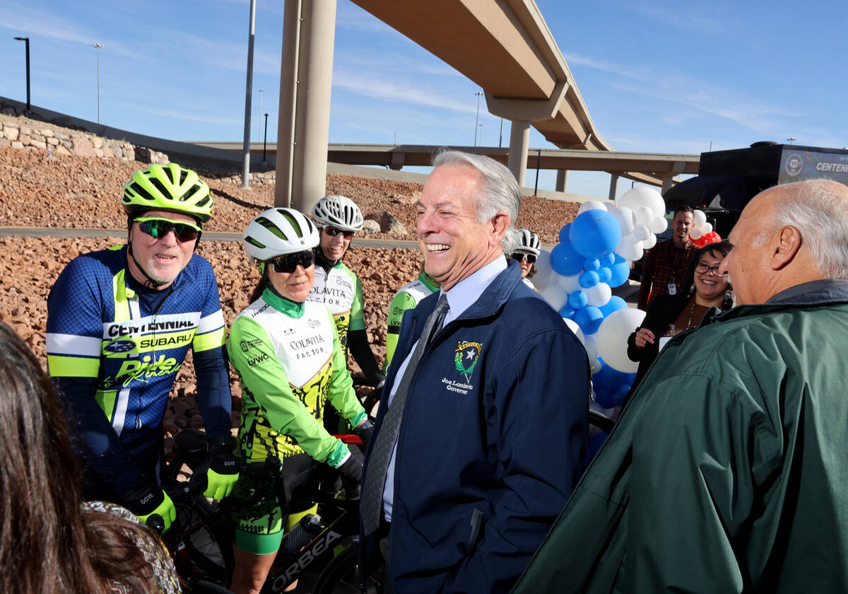 Gov. Joe Lombardo visits with members of the Colavita Las Vegas Women’s Cycling Club and ...
