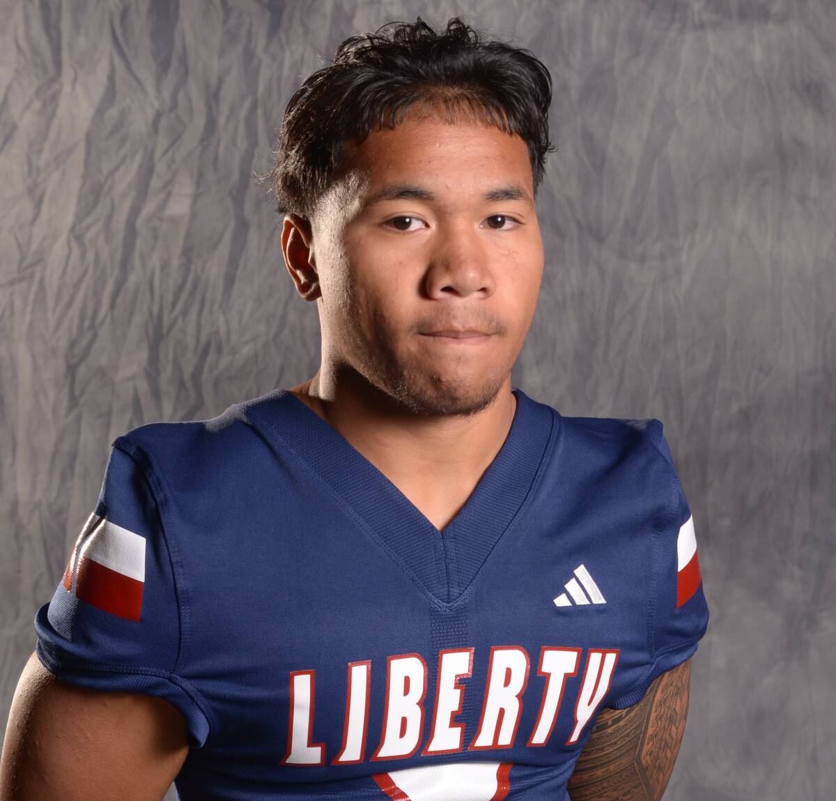 Liberty's Isaiah Lauofo is a member of the Nevada Preps All-Southern Nevada football team.