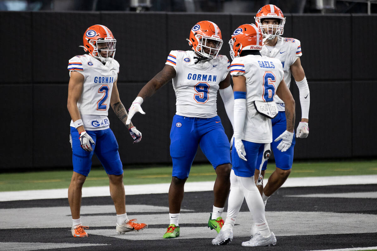 Bishop Gorman celebrates tight end Elija Lofton’s (9) touchdown during the first half of ...