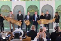 Officials take part in a ribbon-cutting ceremony for the grand opening of Durango Resort and Ca ...
