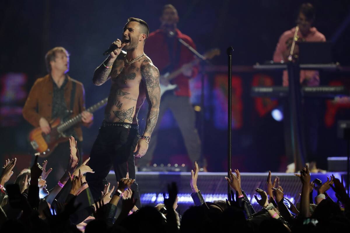 Adam Levine of Maroon 5 performs during halftime of the NFL Super Bowl 53 football game between ...