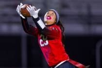 Desert Oasis receiver Akiko Higa (29) hauls in a long pass against Shadow Ridge during the seco ...