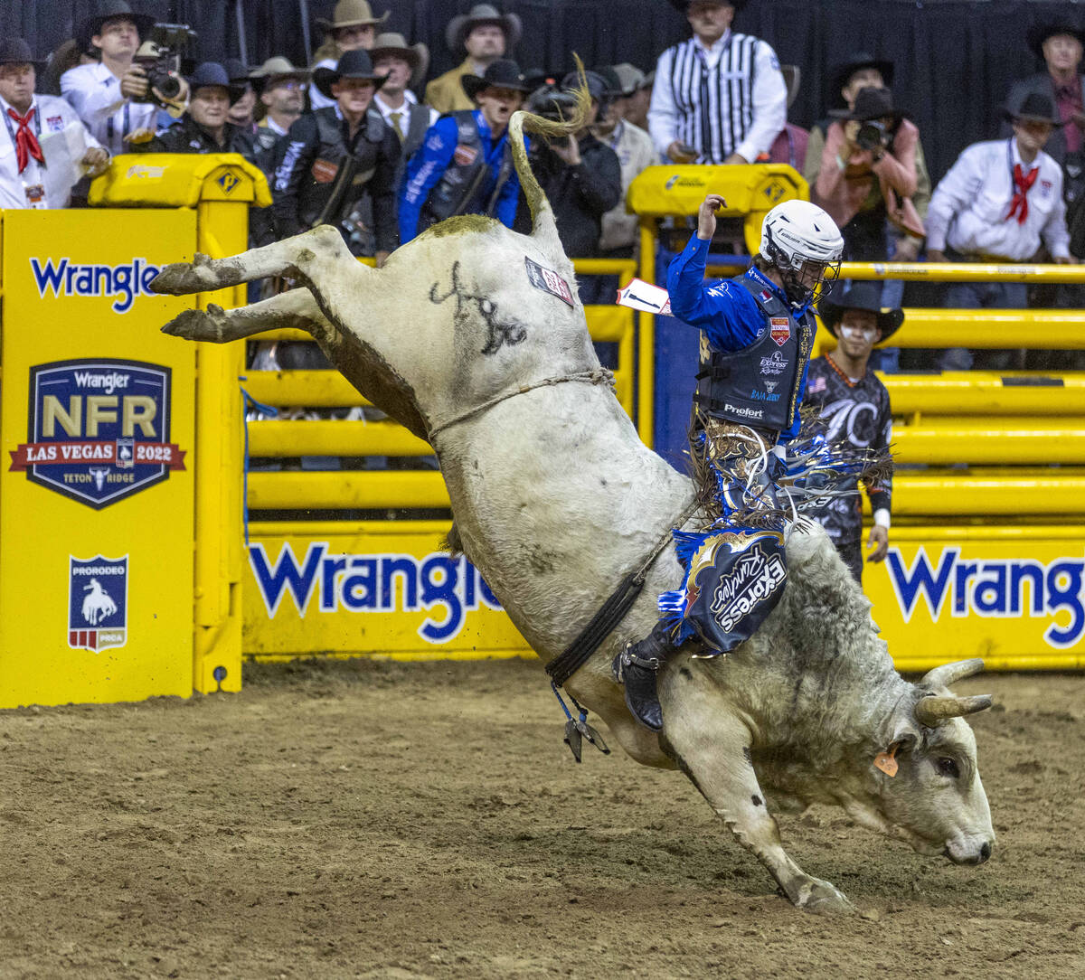 Stetson Wright of Milford, Utah, rides Pookie Holler to a winning score in Bull Riding during t ...