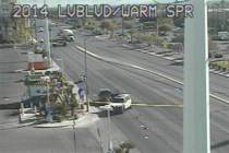 Police investigate a crash involving a pedestrian Tuesday, Dec. 5, 2023, at East Warm Springs R ...