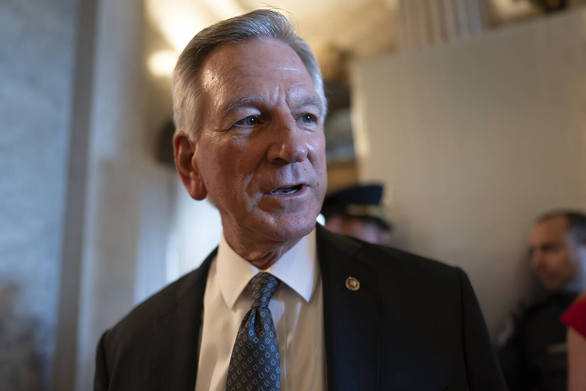 FILE - Sen. Tommy Tuberville, R-Ala., a member of the Senate Armed Services Committee, talks to ...
