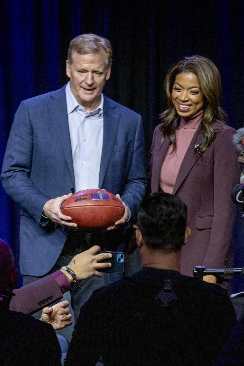 NFL commissioner Roger Goodell, left, poses with Raiders president Sandra Douglass Morgan durin ...
