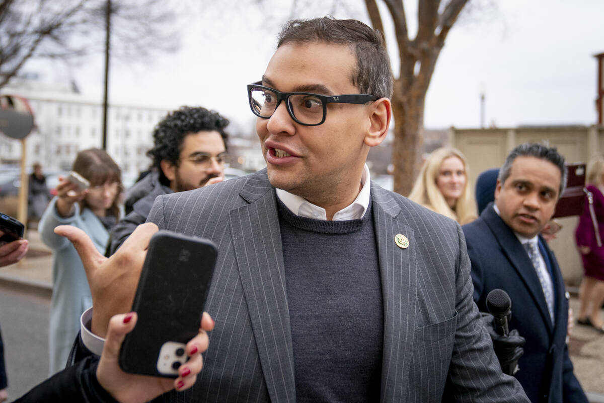 FILE - Rep. George Santos, R-N.Y., leaves a House GOP conference meeting on Capitol Hill in Was ...