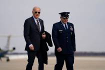 President Joe Biden walks to board Air Force One for a trip to Boston to attend campaign fundra ...