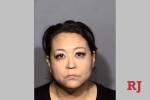Woman arrested in connection with apartment fire that displaced 21
