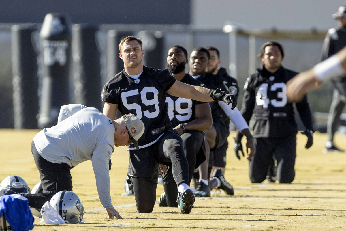 Raiders linebacker Luke Masterson (59) stretches during practice at the Intermountain Health Pe ...