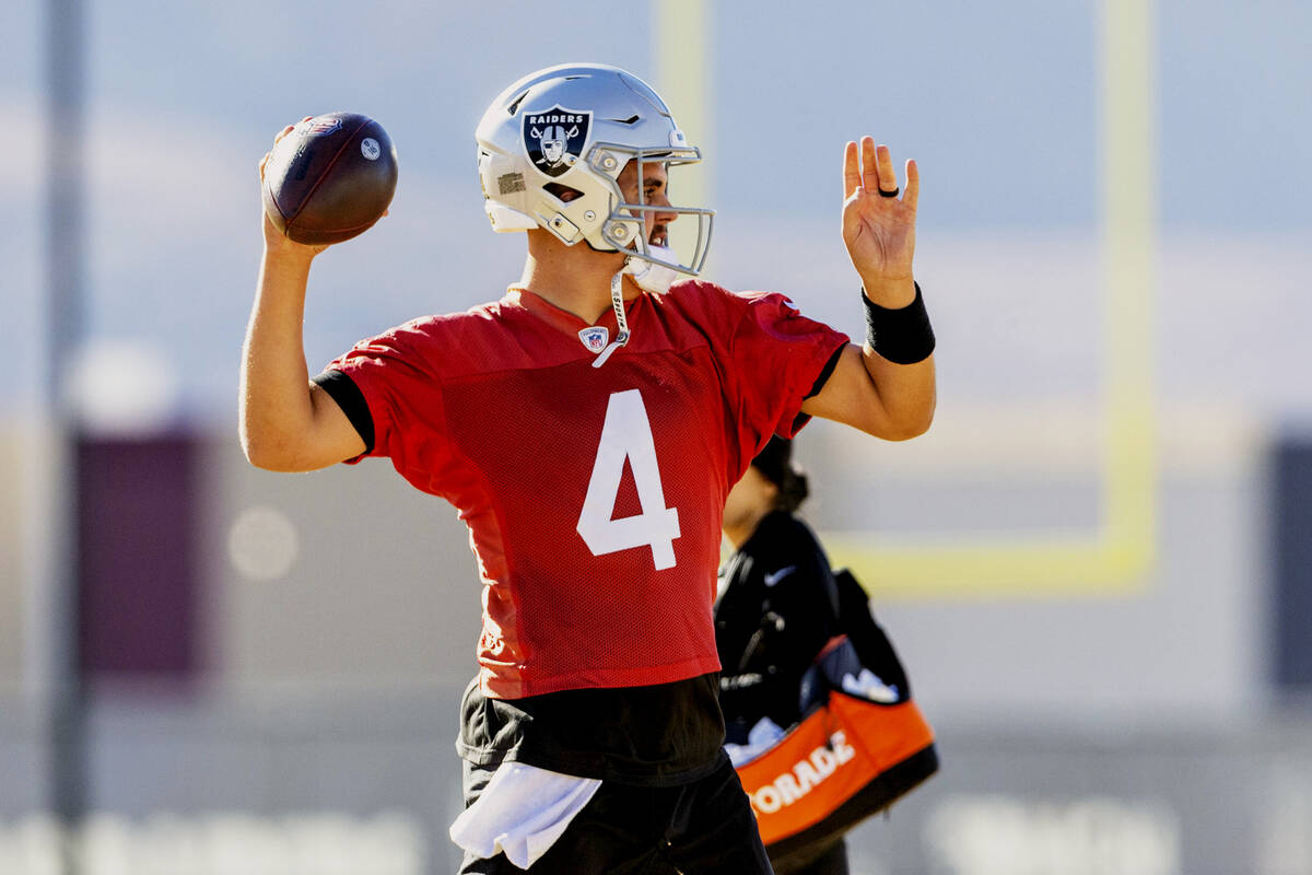 Raiders quarterback Aidan O'Connell (4) makes a throw during practice at the Intermountain Heal ...