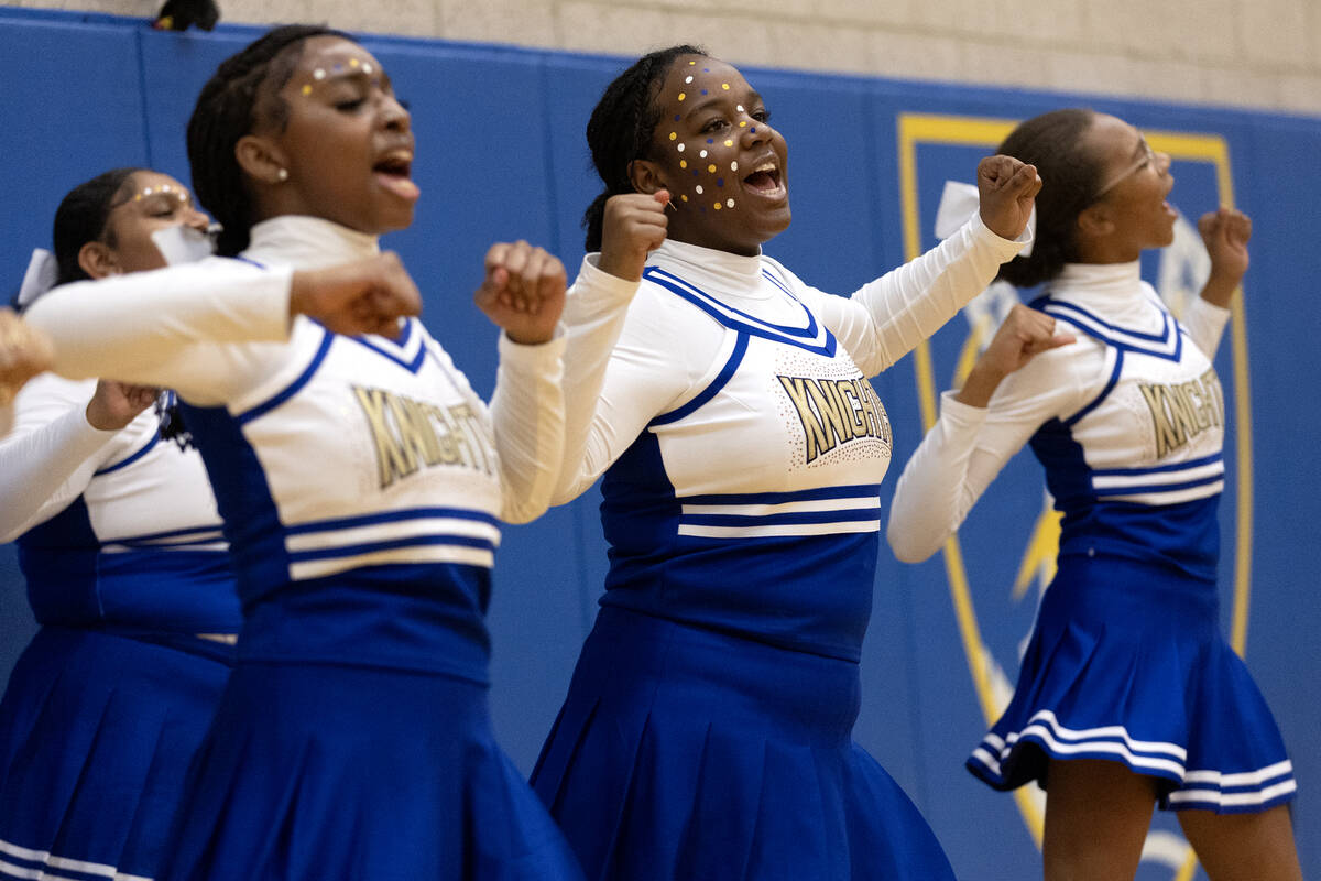 Democracy Prep cheerleaders pump up their team during a girls high school basketball game again ...