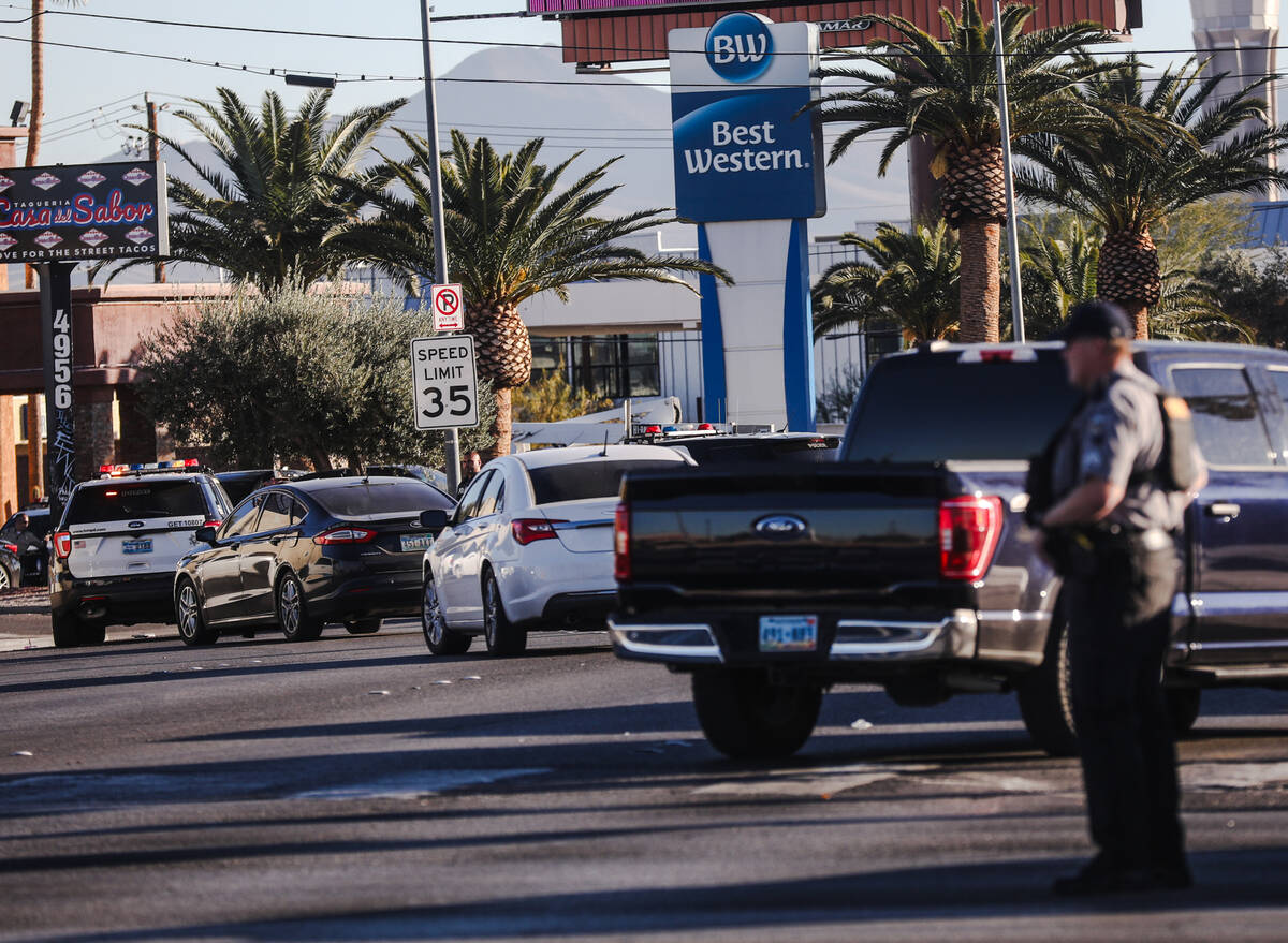 Police presence outside the Best Western on Paradise Road in Las Vegas, Wednesday, Dec. 6, 2023 ...