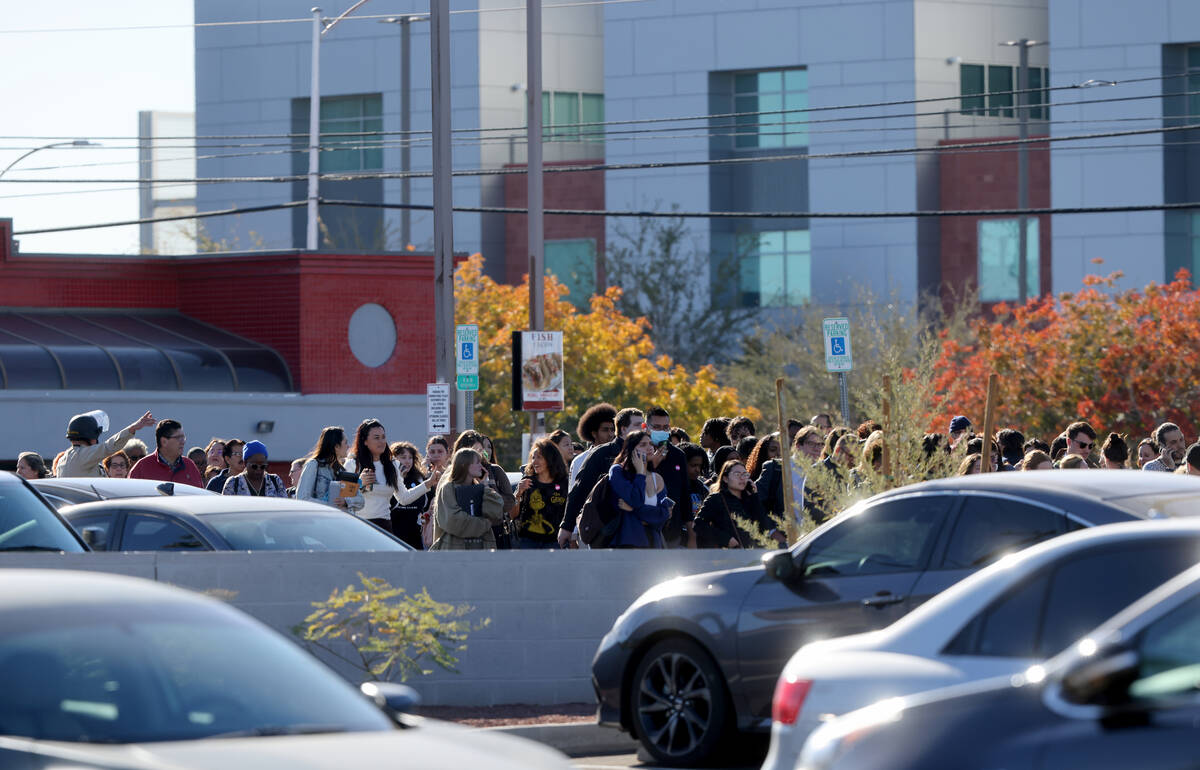 Police evacuate students near Maryland Parkway after a shooing on the UNLV campus in Las Vegas ...