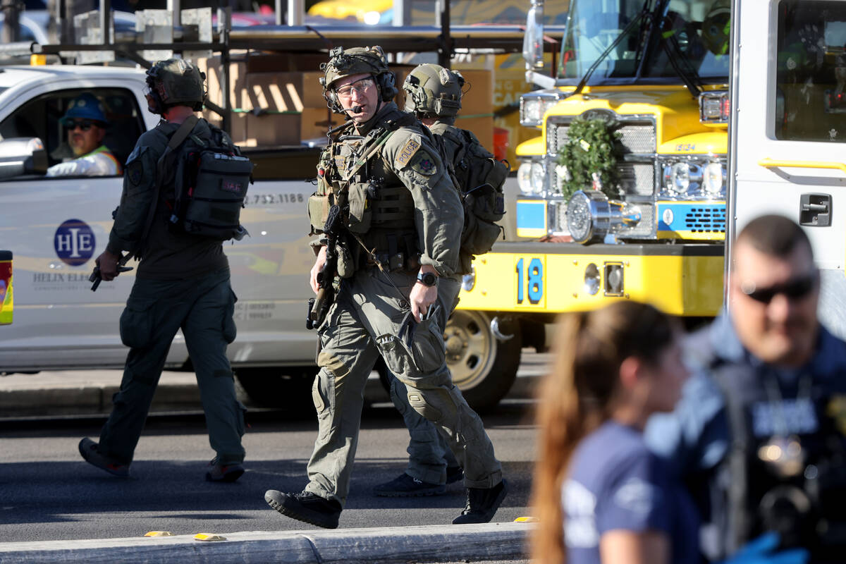 Police patrol on Maryland Parkway after a shooting on the UNLV campus in Las Vegas Wednesday, D ...