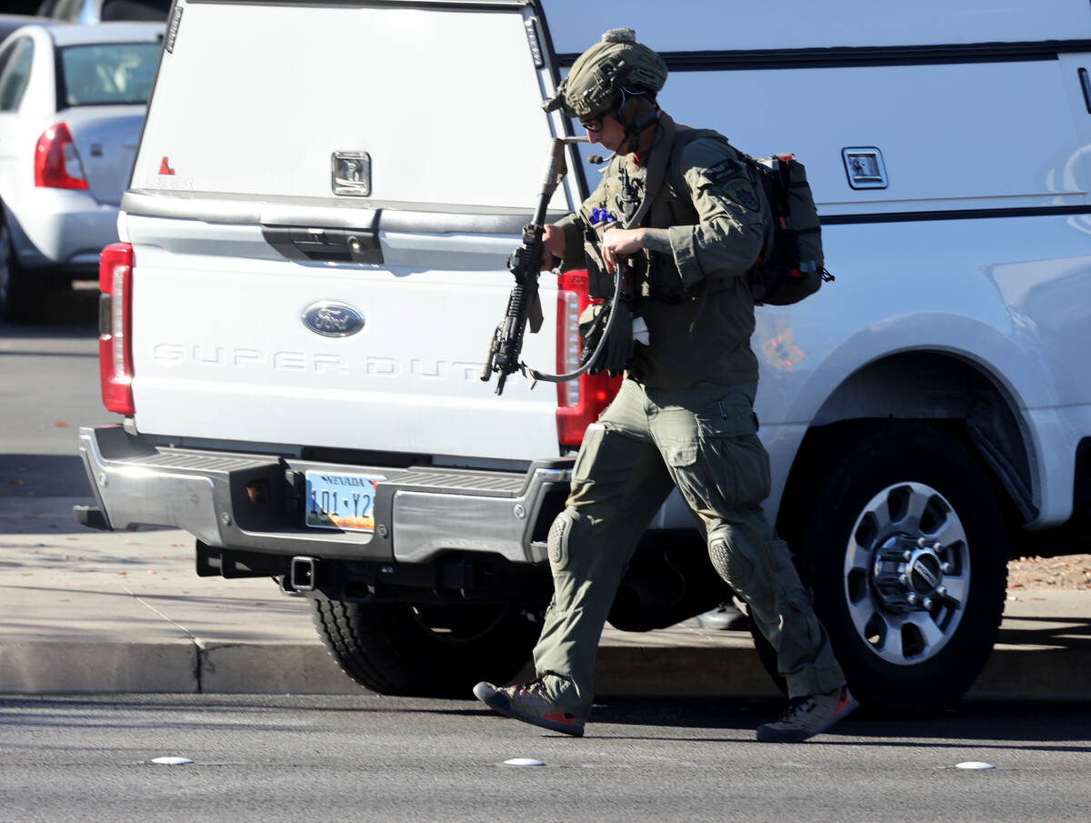 Police patrol on Maryland Parkway after a shooting on the UNLV campus in Las Vegas Wednesday, D ...