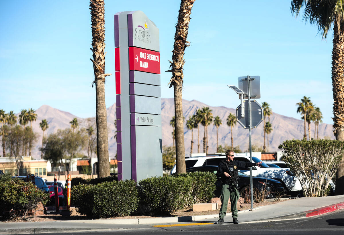 Police gather at Sunrise Hospital and Medical Center after an active shooter event at UNLV, in ...