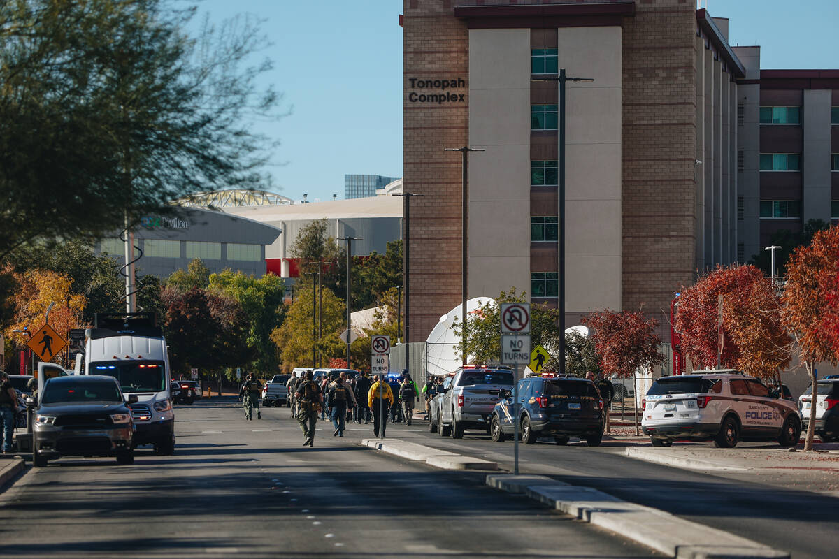 Police are seen at the scene of a shooting on the UNLV campus on Wednesday, Dec. 6, 2023, in La ...