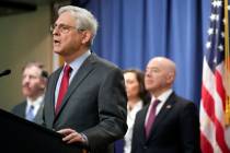 Attorney General Merrick Garland speaks with reporters during a news conference at the Departme ...