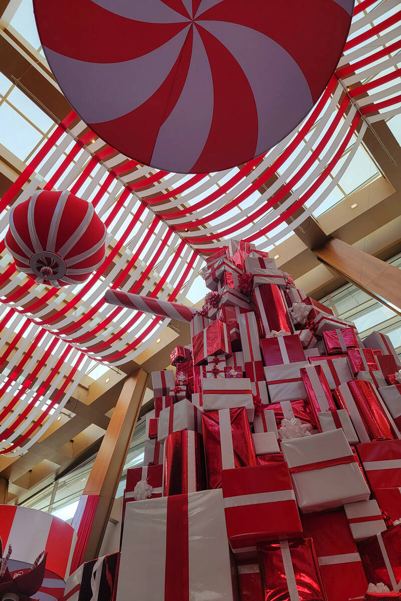 With red-and-white peppermint stripes, swirls and starlights overhead, the Aria’s hotel ...