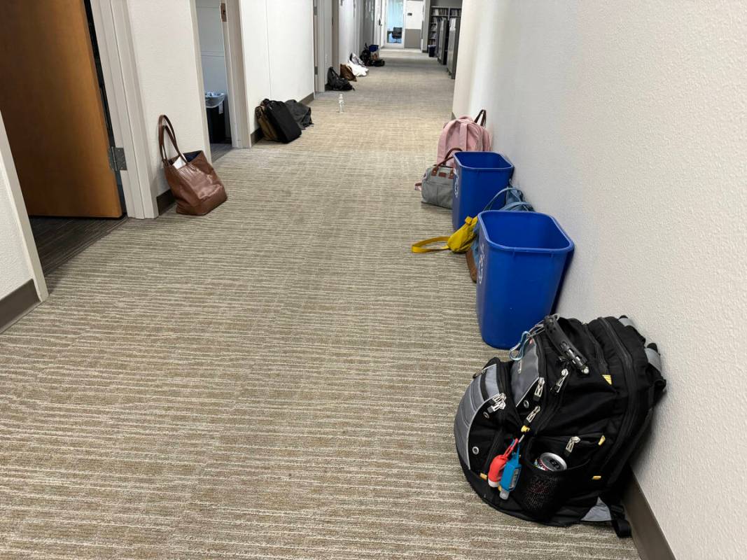 Backpacks and personal items are left behind on the UNLV campus in Las Vegas Thursday, Dec. 7, ...