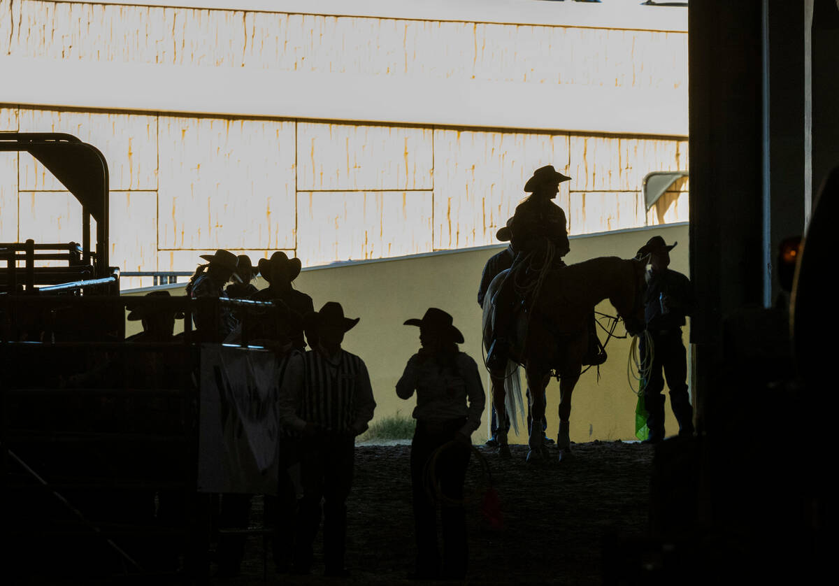 Competitors begin to arrive for the next round during the NFR breakaway roping challenge at Sou ...