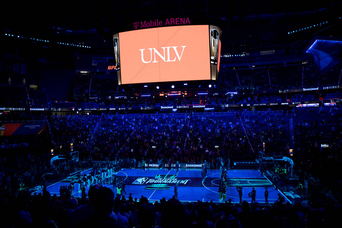 A moment of silence is taken for UNLV after a shooting at the university on Wednesday before an ...