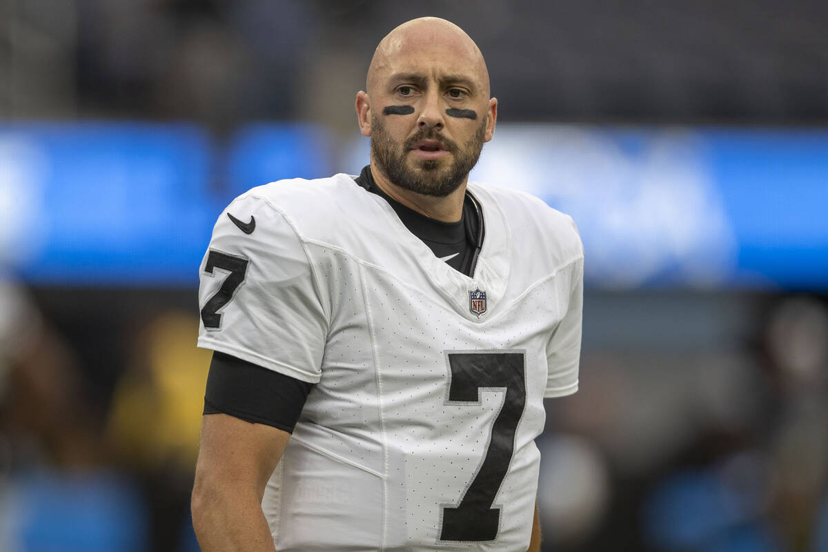 Raiders quarterback Brian Hoyer (7) walks on the field before an NFL game against the Los Angel ...