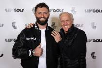 In a photo provided by LIV Golf, Jon Rahm, left, and LIV Golf Commissioner and CEO Greg Norman ...