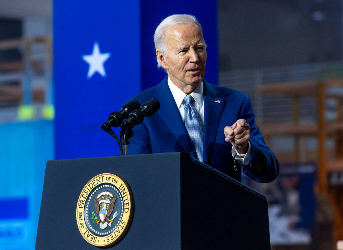 President Joe Biden points to a member of the Nevada legislature as he speaks during a gatherin ...