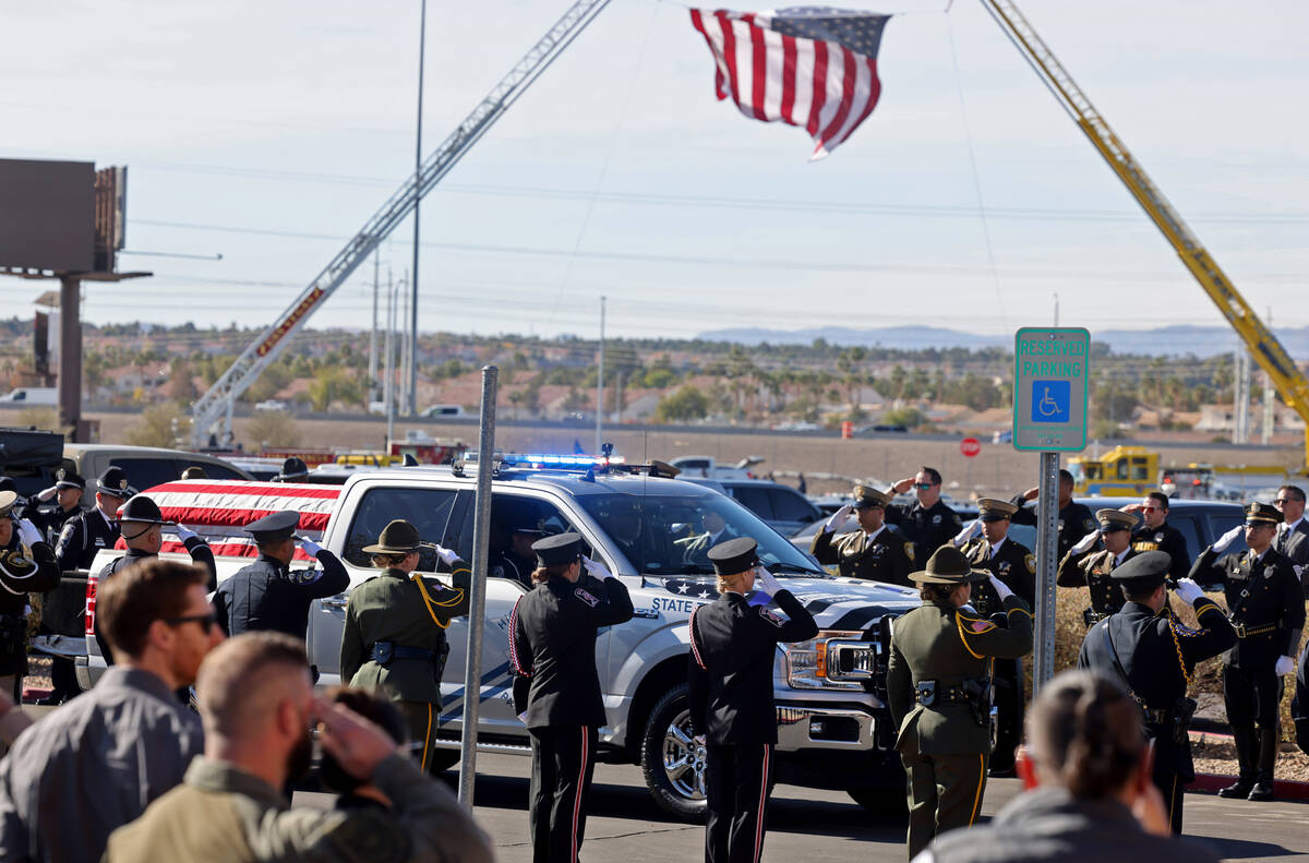 The casket carrying Nevada Highway Patrol trooper Alberto Felix arrives at Central Church ...