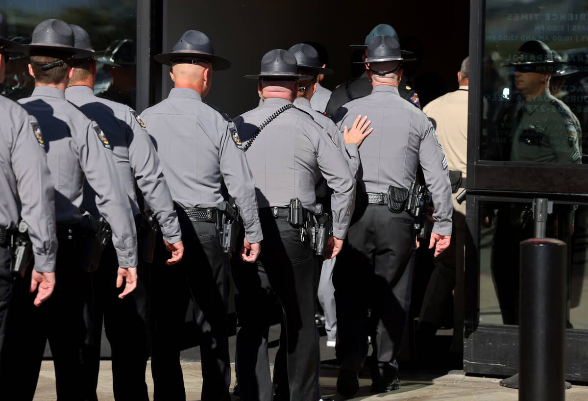 Law enforcement officers file in during the memorial for Nevada Highway Patrol trooper Alberto ...