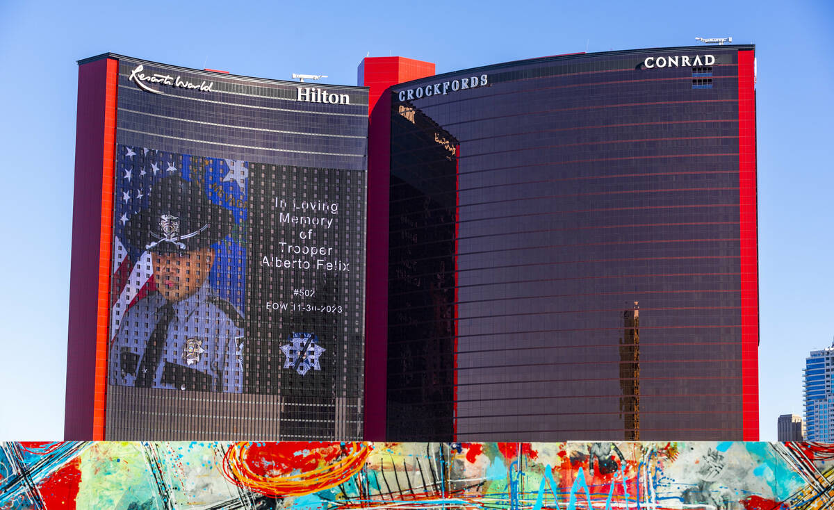 A tribute to Nevada State Trooper Alberto Felix is projected on the big video screen at Resorts ...