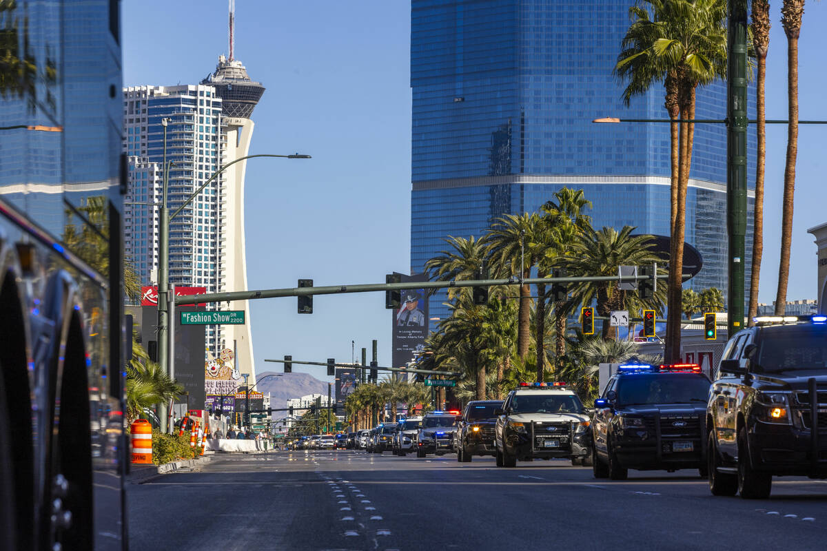 A procession for Nevada State Trooper Alberto Felix moves down the Las Vegas Strip on Friday, D ...